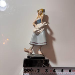 The Vintage Dutch Girl Figurine