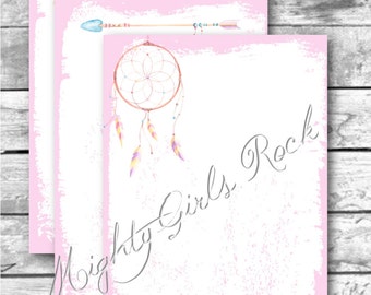 May include: Three pink printable cards with a watercolor design. The top card has a pink and purple arrow with feathers. The middle card has a blue arrow with feathers and a dreamcatcher. The bottom card has a pink heart with the text "Be Brave". The text "Mighty Girls Rock" is written in cursive on the bottom card.
