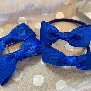 Four royal blue school bows 2x clips 2x ties. School uniform. School hair accessories. School hair ties. School colours