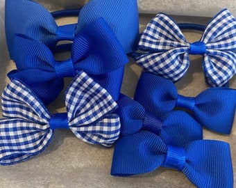 royal blue school uniform hair bow set. Elastic ties and clips. School colours. School bows. School hair accessory