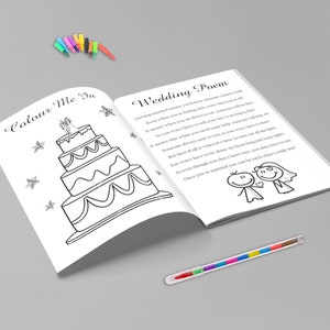 May include: A coloring book with a wedding theme, featuring a three-tiered cake illustration and the text "Colour Me In." The opposite page displays a poem about marriage. A set of colorful markers is included.