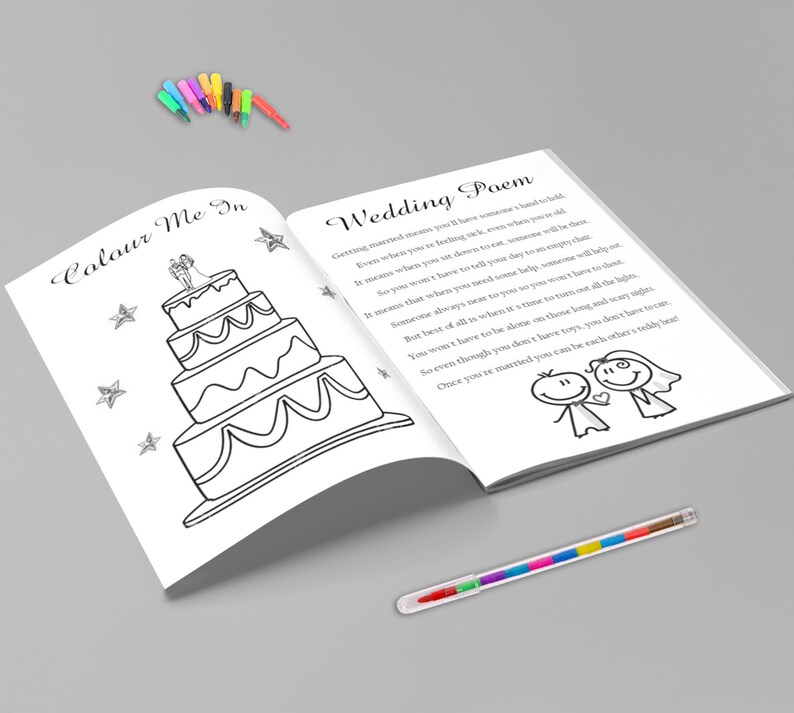 May include: A coloring book with a wedding theme, featuring a three-tiered cake illustration and the text "Colour Me In." The opposite page displays a poem about marriage. A set of colorful markers is included.