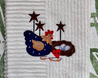 Embroidered Kitchen Towel. Country Star Chicken sitting by her nest of eggs.
