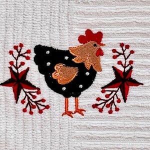 Embroidered Kitchen Towel Chicken Embroidery Design with Stars on a Cream Color Cotton Towel.