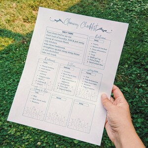 May include: A printable cleaning checklist with a floral design. The checklist is divided into sections for daily tasks, bedrooms, kitchen, living room, and laundry. The daily tasks include: turn down bed, start load of laundry, fold & put away, sweep & vacuum floors, tidy kitchen, wipe down bathroom, straighten up, put away stray items, take out trash.