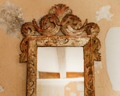 18th century French silver gilt and carved wood mirror with later glass.