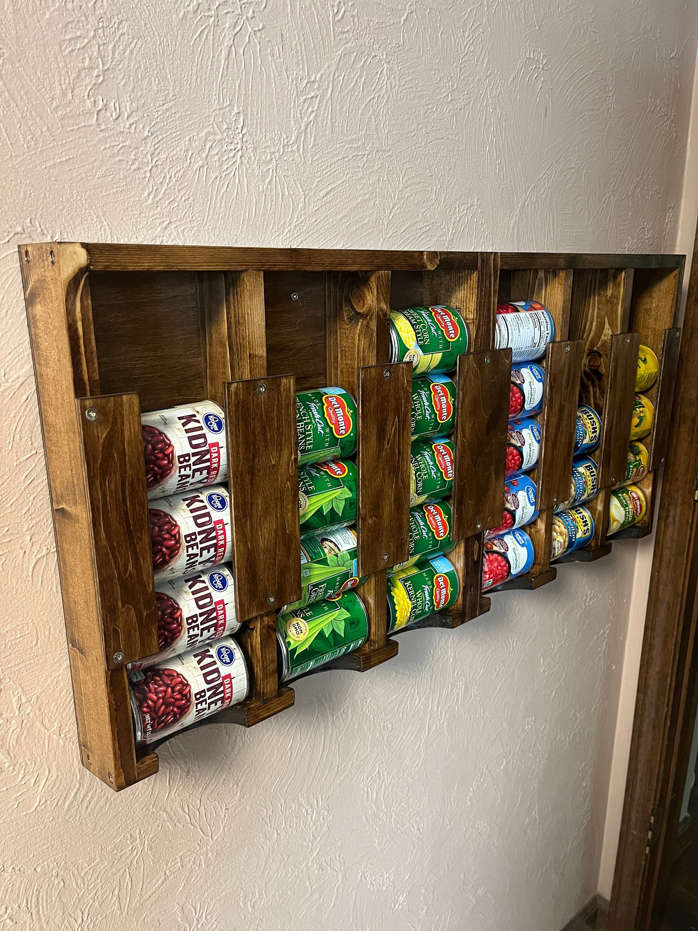 Wall mounted can organizer outlet