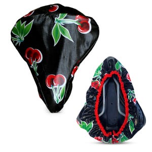 Regenschutz Fahrrad Saddle Cover Sattelschoner Sattelbezug aus wasserabweisendem Wachstuch - Design Cerezas schwarz