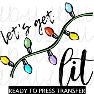 May include: A graphic design featuring a string of colorful Christmas lights with the words "let's get lit" in black script. The phrase "READY TO PRESS TRANSFER" is at the bottom.