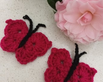 2 fuchsia pink crochet butterfly embellishments, appliques