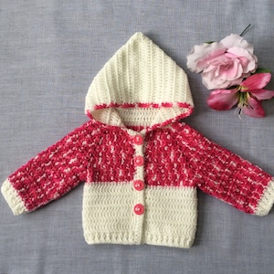 Pink and cream crochet baby sweater/cardigan size 0 to 3months