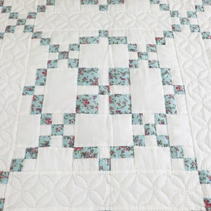 Each quilt, duvet cover, bedsheet is a homemade heirloom crafted with care, showcasing the artisanship of traditional quilting techniques. Hand quilted, hand sewn, and hand appliqued only, our quilts are a testament to quality and craftsmanship.