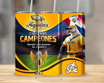 May include: A yellow and black stainless steel tumbler with a baseball theme. The tumbler features a cartoon eagle wearing a baseball uniform with the text "Aguilas Cibaenas Campeones" and "Recojan que ganaron las Aguilas!!".