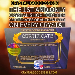 May include: A rectangular certificate of authenticity with a dark blue and gold border. It features the text CRYSTAL GODDESS 888, CERTIFICATE OF AUTHENTICITY, and a circular holographic sticker that reads CRYSTAL GODDESS 888 CERTIFIED AUTHENTIC.