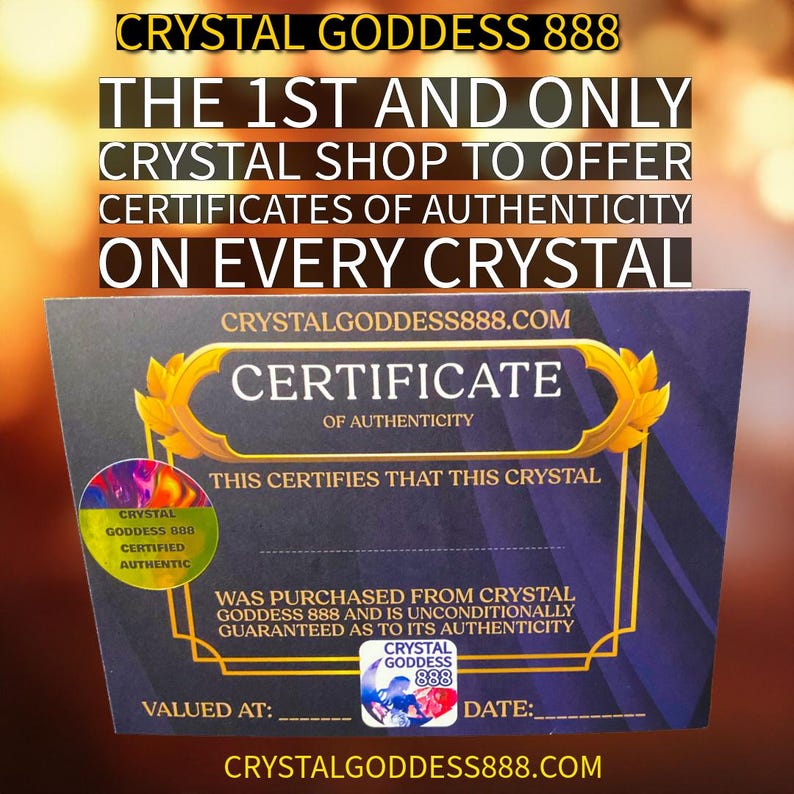 May include: A rectangular certificate of authenticity with a dark blue and gold border. It features the text CRYSTAL GODDESS 888, CERTIFICATE OF AUTHENTICITY, and a circular holographic sticker that reads CRYSTAL GODDESS 888 CERTIFIED AUTHENTIC.