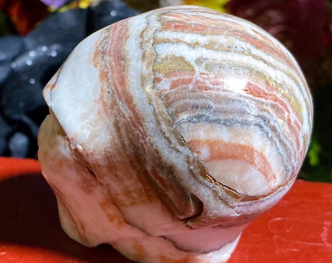 CLEARANCE ~ Banded Calcite Crystal Mini Skull ~ 5 oz. ~ 2" Long ~ Sparkling Pink, White, Gold & Black Colors ~ Hand-Carved Display Sculpture
