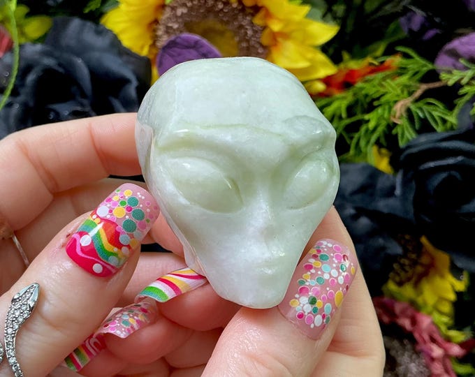 Moss Agate Crystal Skull: Hand-Carved Green & White Display Sculpture