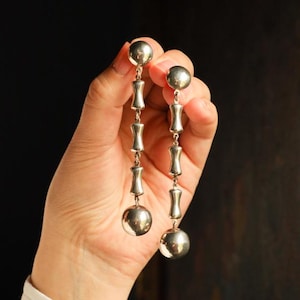 Sterling Silver Dangle Earrings: Long Bone Design