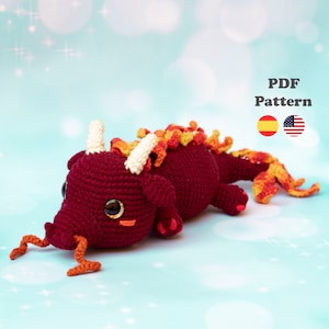 Puede incluir: Patrón de crochet para un juguete amigurumi de dragón rojo y naranja. El patrón está disponible en español e inglés. Patrón PDF.