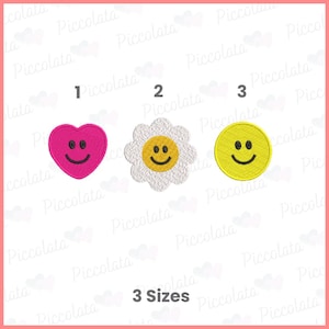 May include: Three embroidery designs featuring a pink heart with a smiley face, a white daisy with a yellow center and a smiley face, and a yellow circle with a smiley face. The designs are numbered 1, 2, and 3, and the text "3 Sizes" is below the designs.