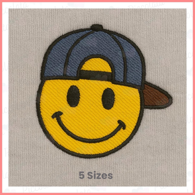 May include: Embroidered iron-on patch of a yellow smiley face wearing a blue baseball cap with a brown brim. The patch is available in 5 sizes.