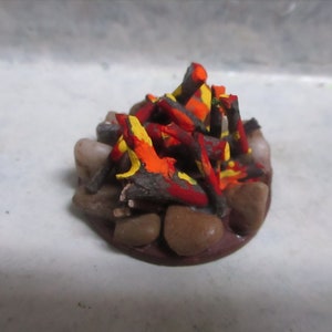 Small 1&quot;h x 1 1/2&quot;w handcrafted doll/dollhouse campfire/real wood/handpainted fire/wood base/rock border