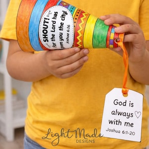 May include: A colorful paper trumpet craft with the text "SHOUT! For the Lord has given you the city! Joshua 6:16." An orange ribbon and a tag that says "God is always with me Joshua 6:1-20" are attached.