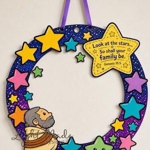 May include: A circular wreath craft featuring a dark blue starry background with colorful stars and a cartoon figure of a man. A large yellow star displays the text: Look at the stars... So shall your family be. Genesis 15:5. Includes a purple ribbon.