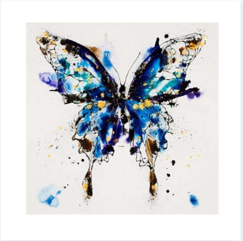 May include: A watercolor painting of a blue butterfly with gold and black accents. The butterfly is set against a white background with splatters of blue, purple, and brown paint.