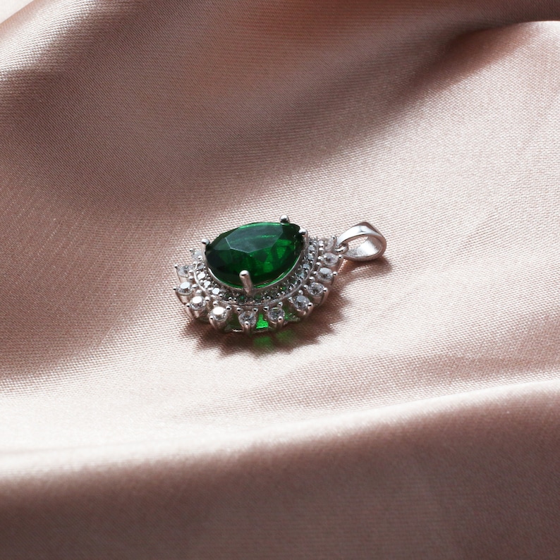 Sterling silver necklace featuring sparkling green spinel and CZ stones, elegant gemstone jewelry