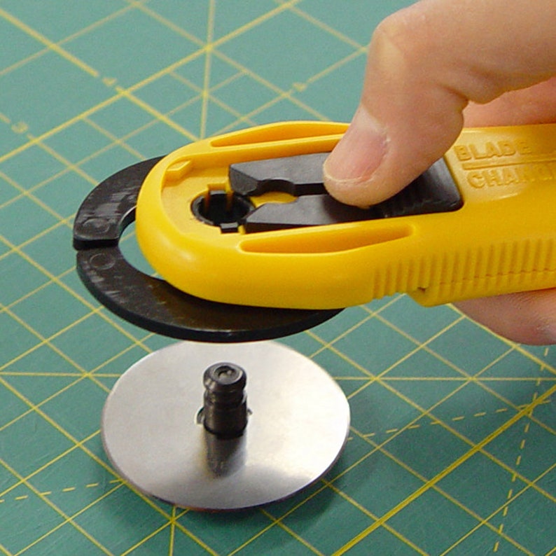OLFA 45mm Quick-Change Rotary Cutter - Fabric & Craft Cutting Tool With Safety Cover (Aqua)