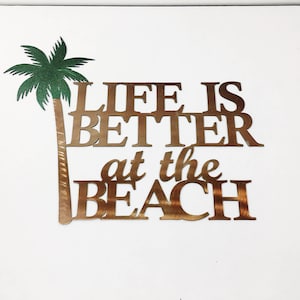 Arte mural de metal con palmera La vida es mejor en la playa