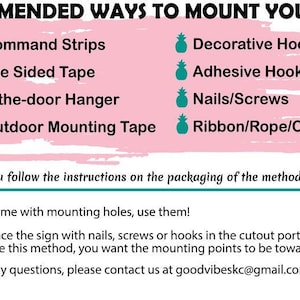 May include: A pink and teal graphic with the text "RECOMMENDED WAYS TO MOUNT YOUR SIGN" and a list of ways to mount a sign, including 3M Command Strips, double-sided tape, over-the-door hanger, 3M outdoor mounting tape, decorative hook, adhesive hook, nails/screws, and ribbon/rope/chain. The graphic also includes the text "Make sure you follow the instructions on the packaging of the method you choose." and "If your sign came with mounting holes, use them!"