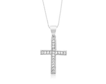 May include: A silver-colored pendant necklace featuring a cross design. The cross is encrusted with small, clear gemstones, and hangs from a delicate chain. The jewelry is set against a white background.