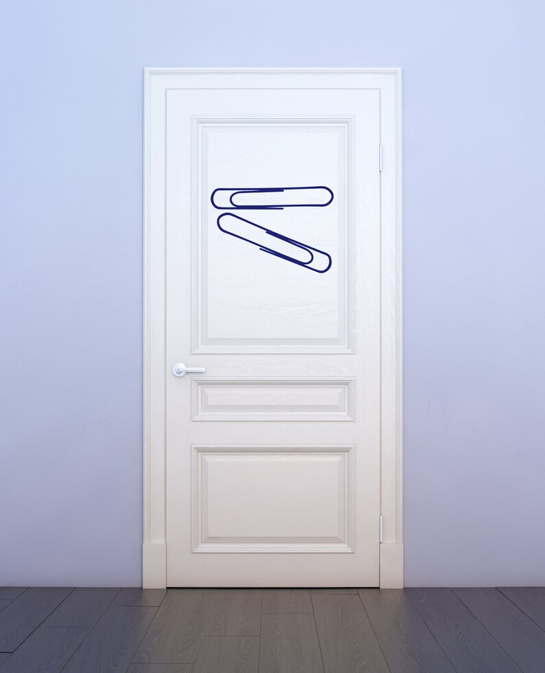 Paper clip wall art design in sleek minimalist style, office decor graphic suited for teacher gifts, study room inspiration, and symbolic remembrance themes.