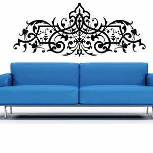 Baroque wall decor created with detailed ornamental flourishes and curved motifs that capture dramatic movement, artistic craftsmanship, and rich old world charm.