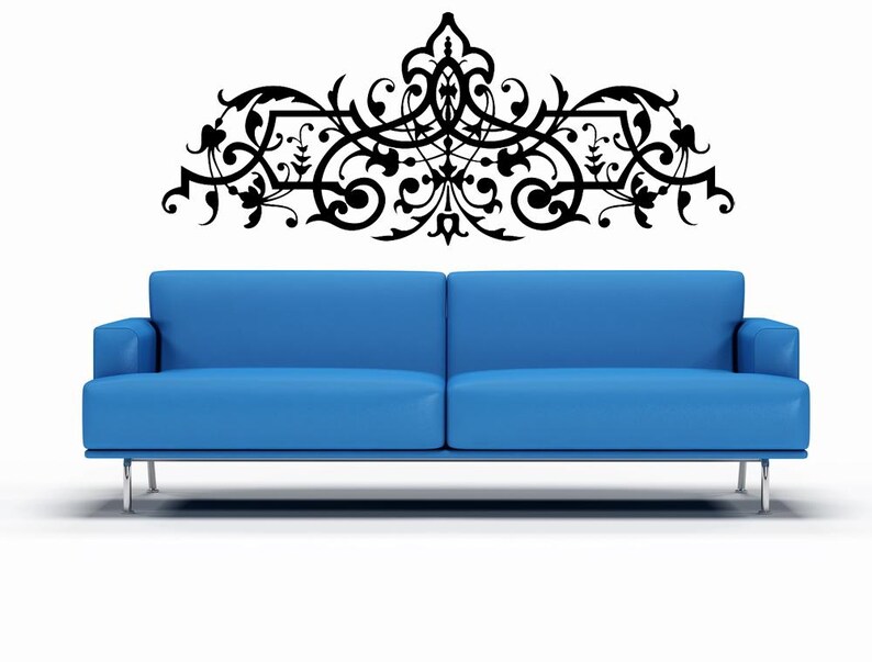 Baroque wall decor created with detailed ornamental flourishes and curved motifs that capture dramatic movement, artistic craftsmanship, and rich old world charm.