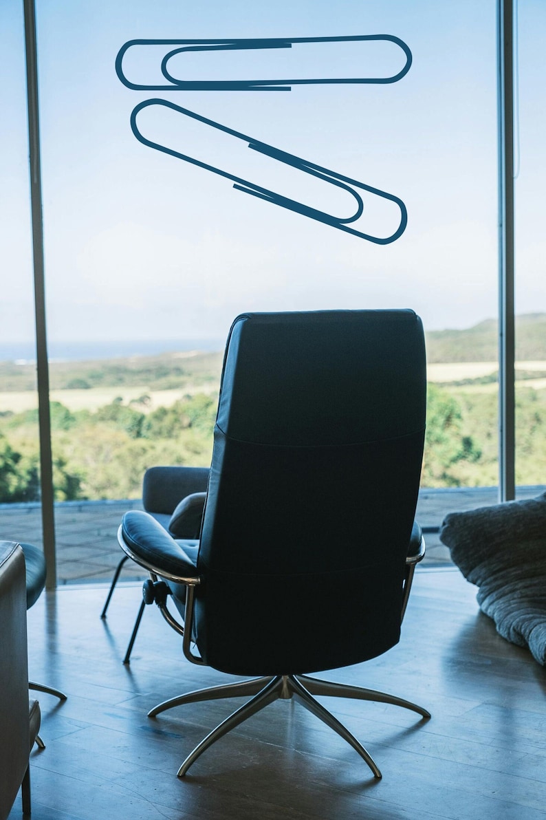 Office wall art with large paper clip design in clean line style, modern minimalist decor for study room, corporate workspace, and thoughtful historical reference themes.