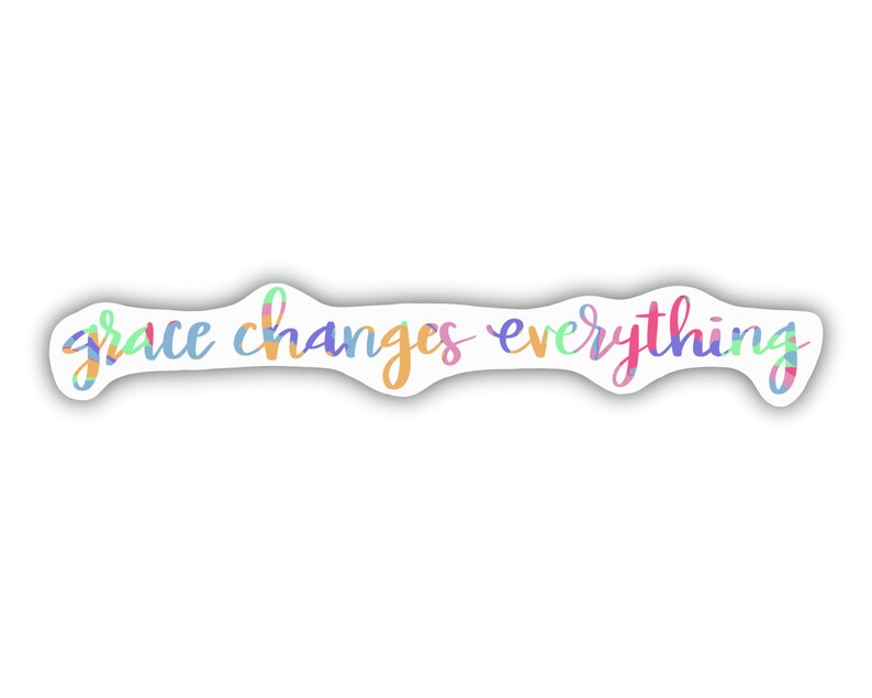 May include: A colorful sticker with the text "grace changes everything" in a handwritten font.