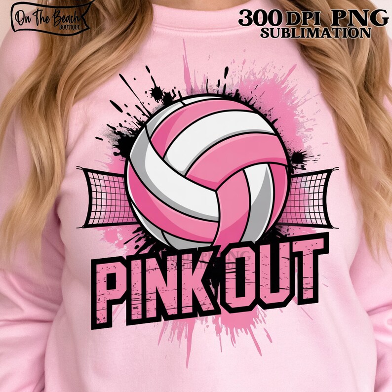 Op de afbeelding: Zachtroze sweatshirt met een volleybalontwerp in roze, wit en zwart. De woorden "PINK OUT" staan in zwarte letters onder de volleybal. Het sweatshirt heeft bovenaan de tekst "300 DPI PNG SUBIMATION".