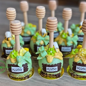 12 Hunny Pot Cake Pops with honey dipper stick,  Pooh Inspired honey pots, Baby shower cake pops