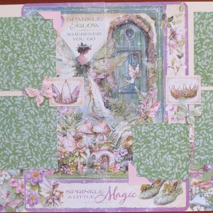 May include: A scrapbook page with a fairy theme. It features a central illustration of a fairy and a door, surrounded by floral and mushroom illustrations. The page includes the text "Sparkle & Glow Wherever You Go" and "Sprinkle a Little Magic".