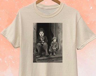 Camiseta Charlie Caplin the Kid - Colores disponibles Blanco, Natural, Rosa claro, Gris