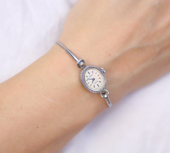 delicate silver watch