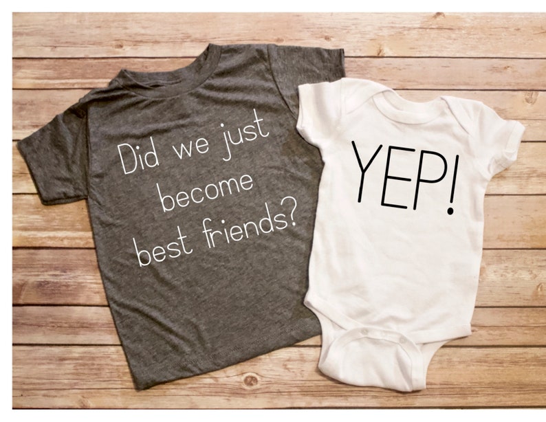 May include: Two shirts, one grey and one white, with a matching set of text. The grey shirt says "Did we just become best friends?" and the white shirt says "YEP!"