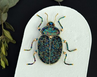 Broche de escarabajo con cuentas, bordado, joyería de insectos, hecho a mano en una tienda ucraniana.