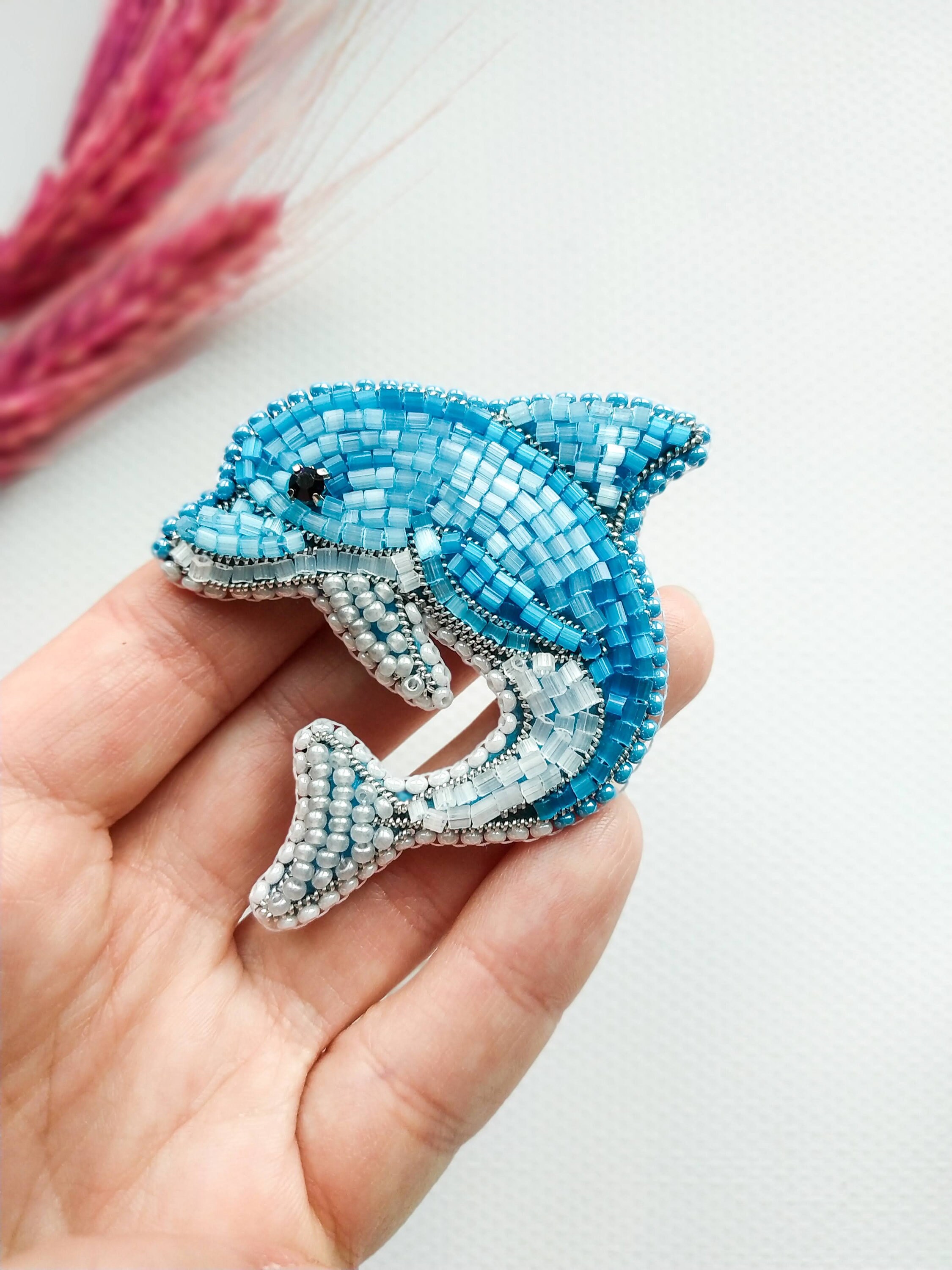 Dolphin brooch on sale