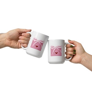 La obra de arte de la carta de bondad compartida de Isabella en la taza LISTO PARA ENVIAR