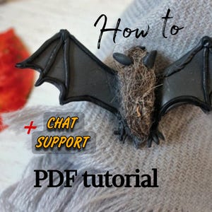 May include: How to make a bat craft with a PDF tutorial and chat support. The bat is made of black felt and has a furry body.