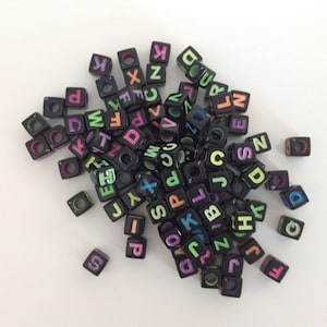 letter beads black